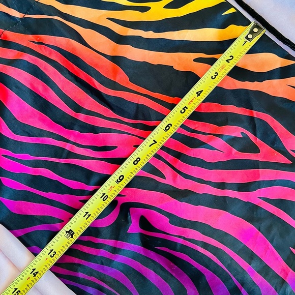 Spirit Halloween Drawstring Rainbow & Tiger Stripe Backpack with Dragon Tale - Picture 8 of 8